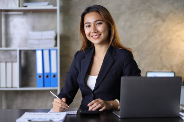 Portrait of a charming business woman in the office.